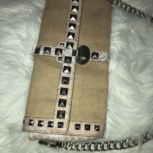 BCBG fashion clutch with chain strap.
